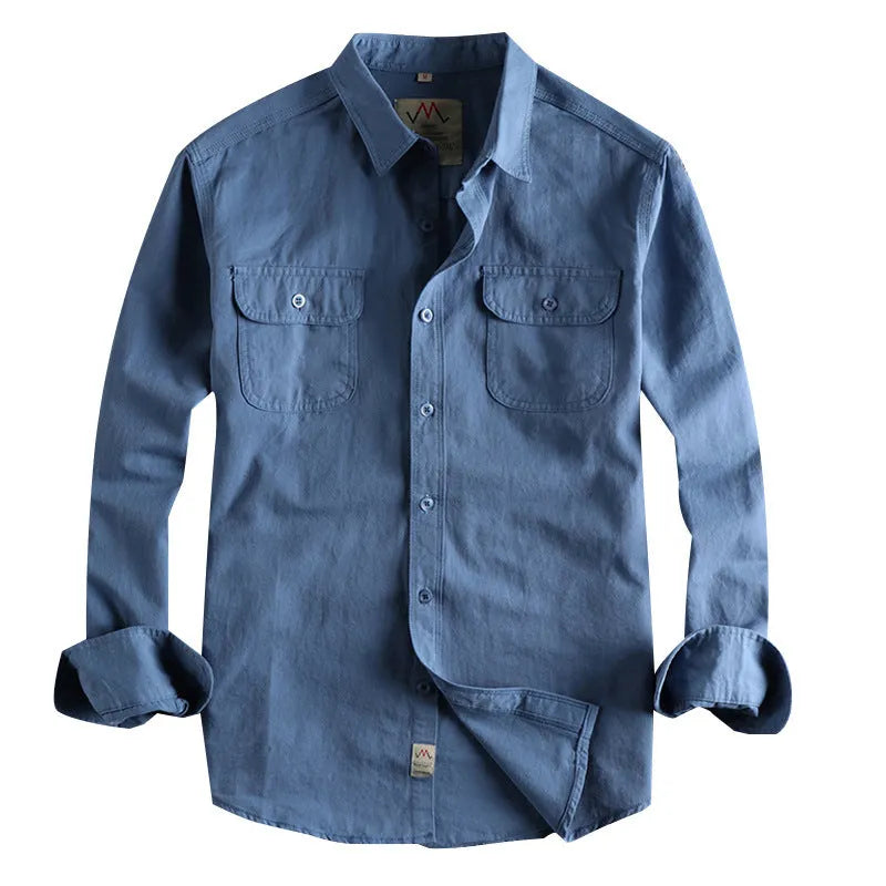 Men's solid colour cotton shirt with cardigan style collar in light blue, showing long sleeves and regular fit
