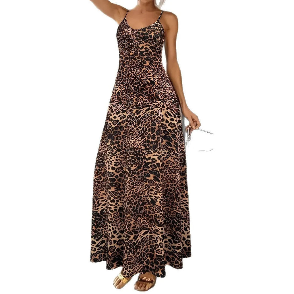 Dark brown leopard print women's long dress with sleeveless round neck and sling straps on a mannequin.