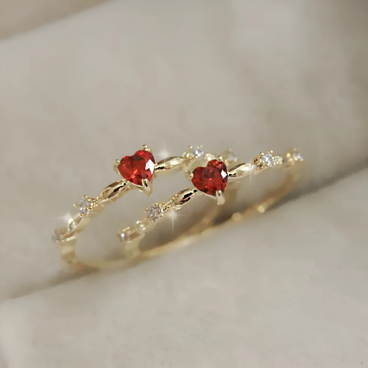 Personalised zircon peach heart ring in gold or silver electroplated finish on copper, available in UK sizes 6 to 10
