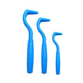 Set of three coloured pet tick removal hooks for dogs on a white background.