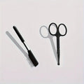 Black ambidextrous pet grooming brush with soft tear stain remover and comb for dogs and cats