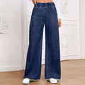 Light blue washed wide-leg denim trousers on a hanger, showing mid-rise waist and straight leg cut.