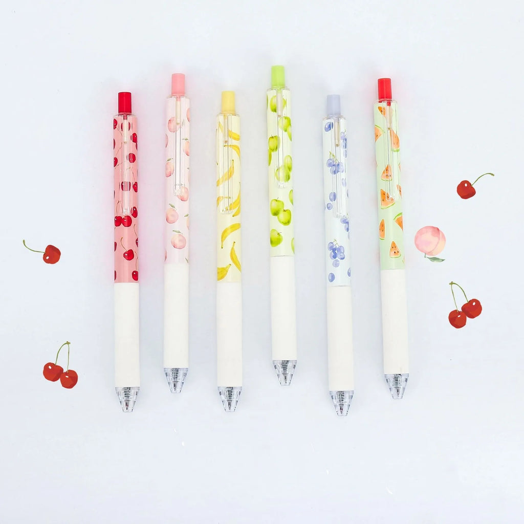 Three fruit-scented press-action pens with 0.5mm quick-drying black ink refills on writing paper