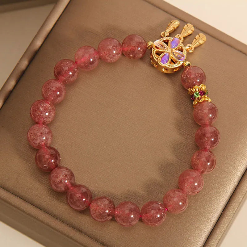 Women's strawberry quartz crystal bracelet with four-leaf dream catcher ball pendant