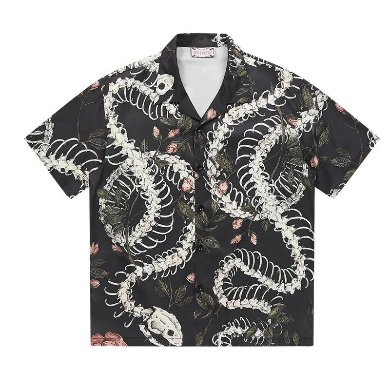 Short sleeve Cuban collar shirt with printed snake bone floral pattern in loose fit.