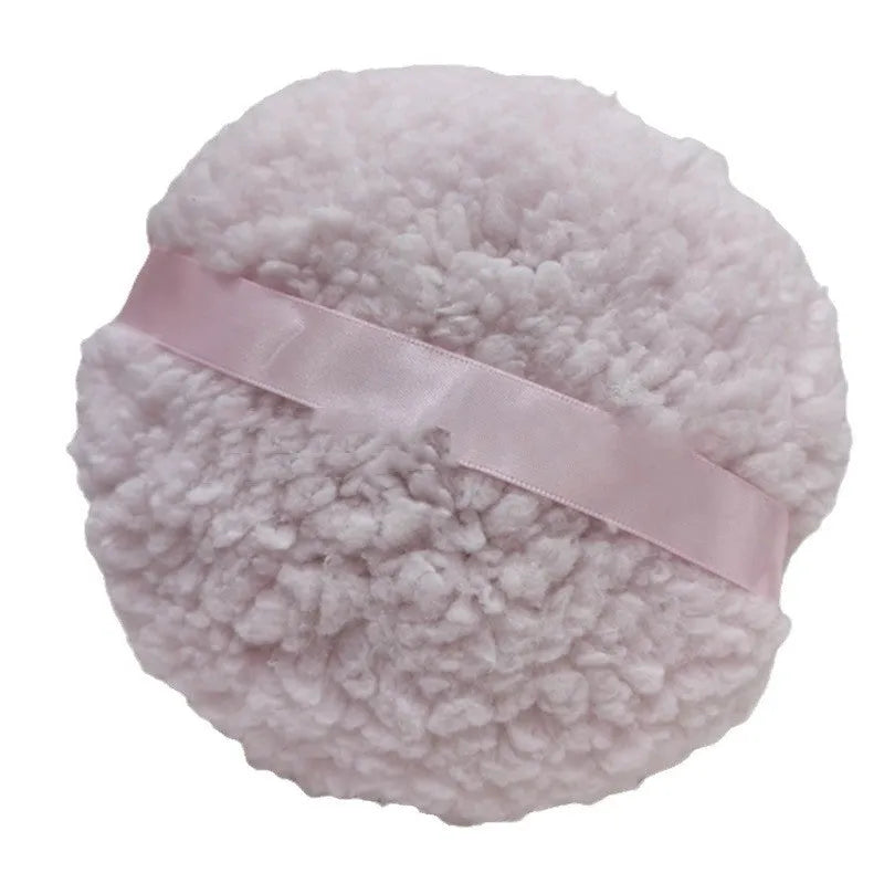 Oversized rectangular plush powder puff in pink, white, and skin colour options