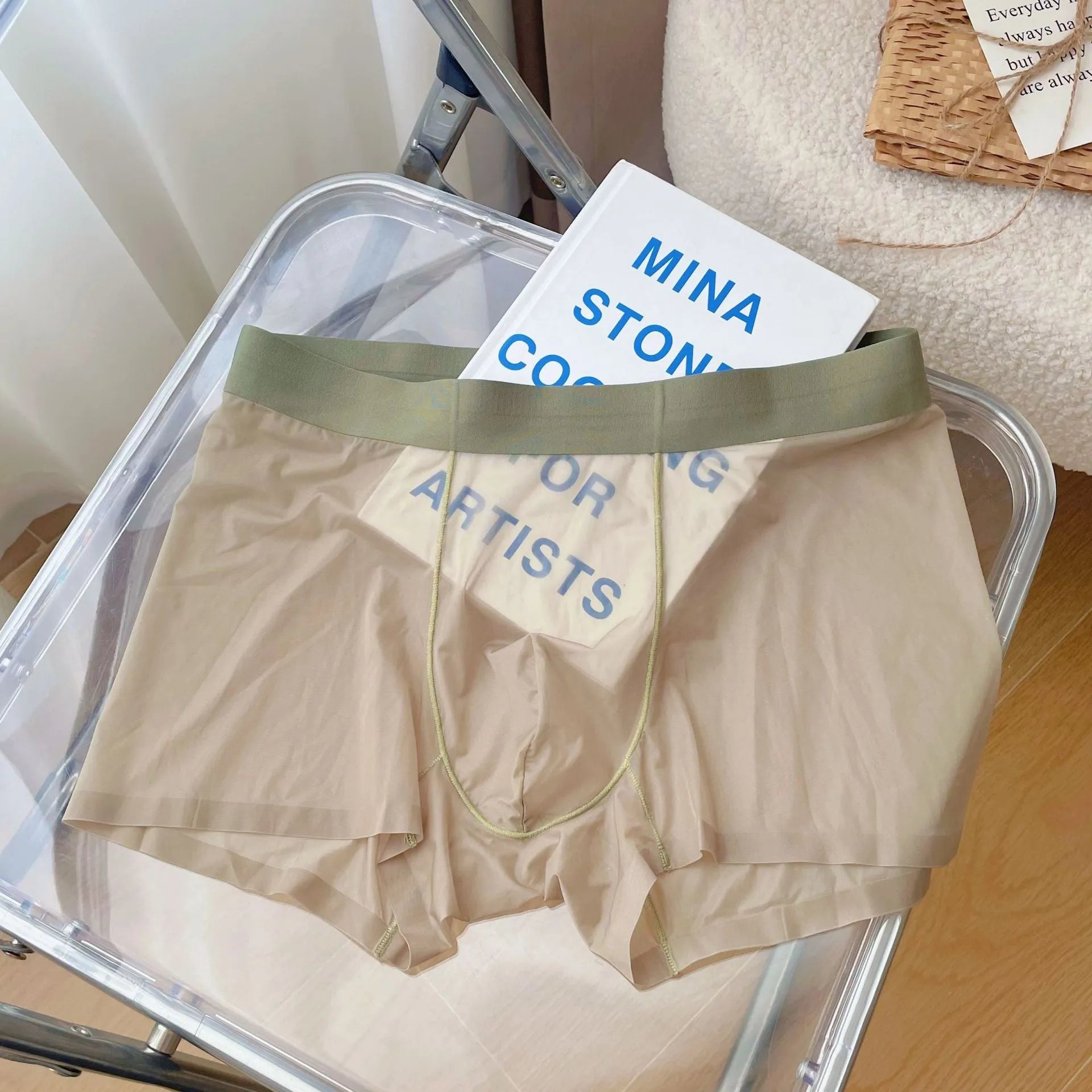 Men's thin seamless boxer shorts in light brown colour showing mid waist and quick-dry fabric.