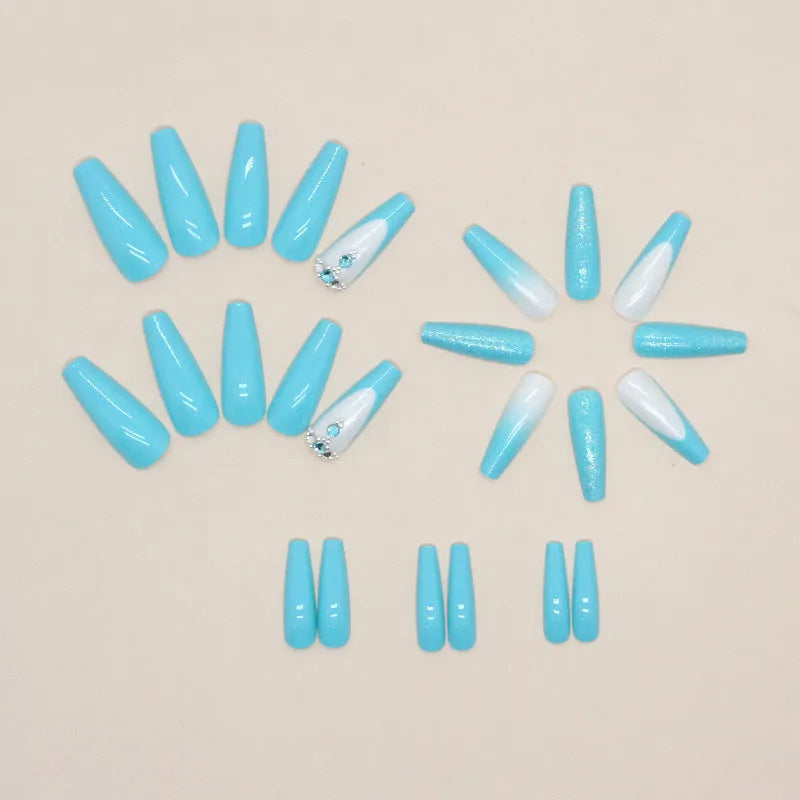 Long ballet false nails in smart blue diamond colour with adhesive glue