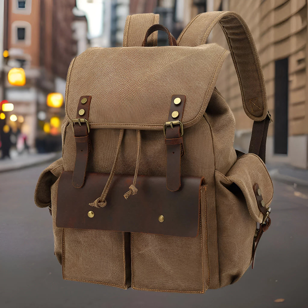 Retro wear resistant canvas backpack in military green with antique bronze hardware, showing front and side profiles.