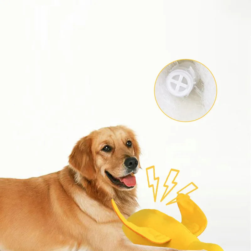 Yellow plush duck dog training toy with squeaker and treat dispensing features
