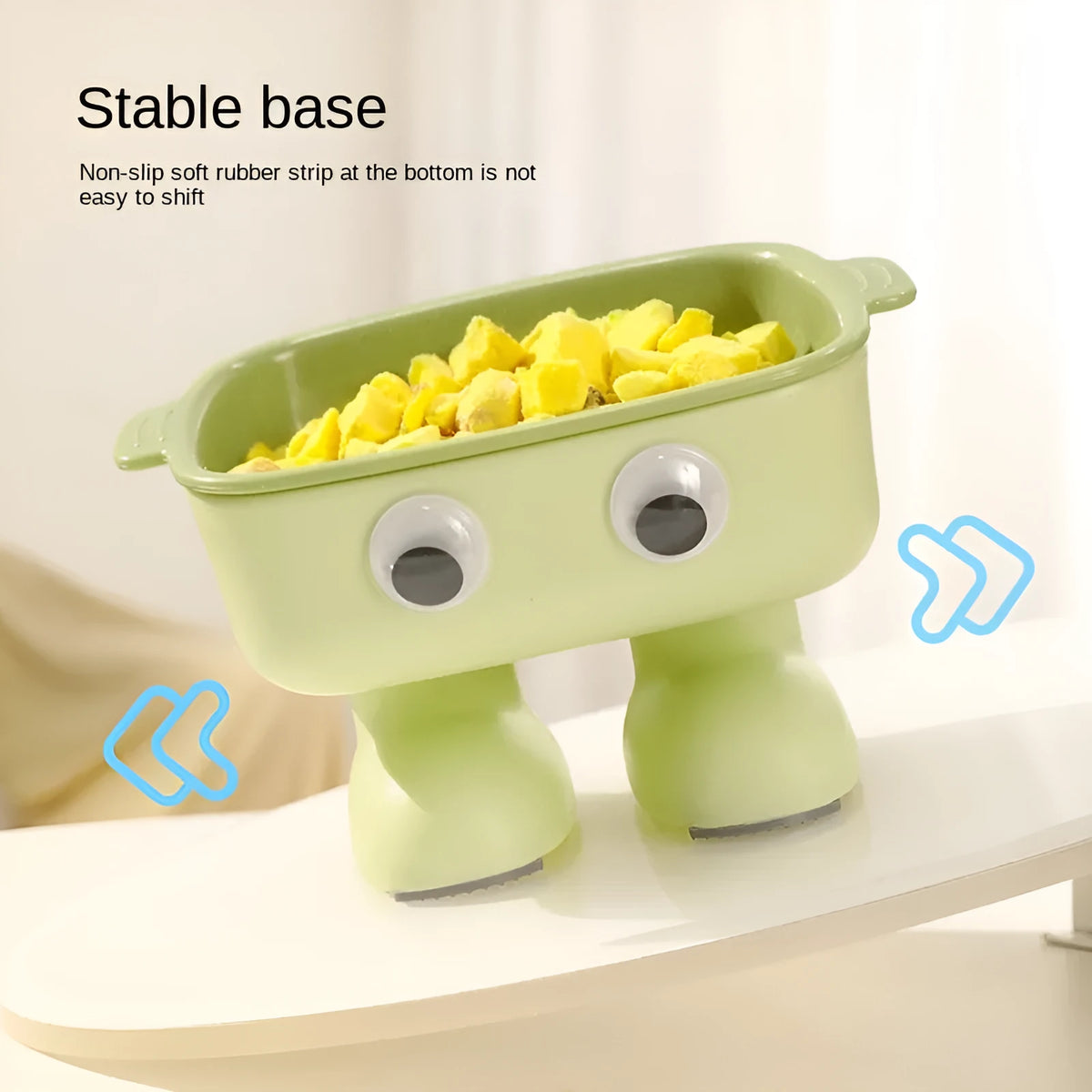 Green robot-shaped elevated cat bowl with tilted design and anti-slip base