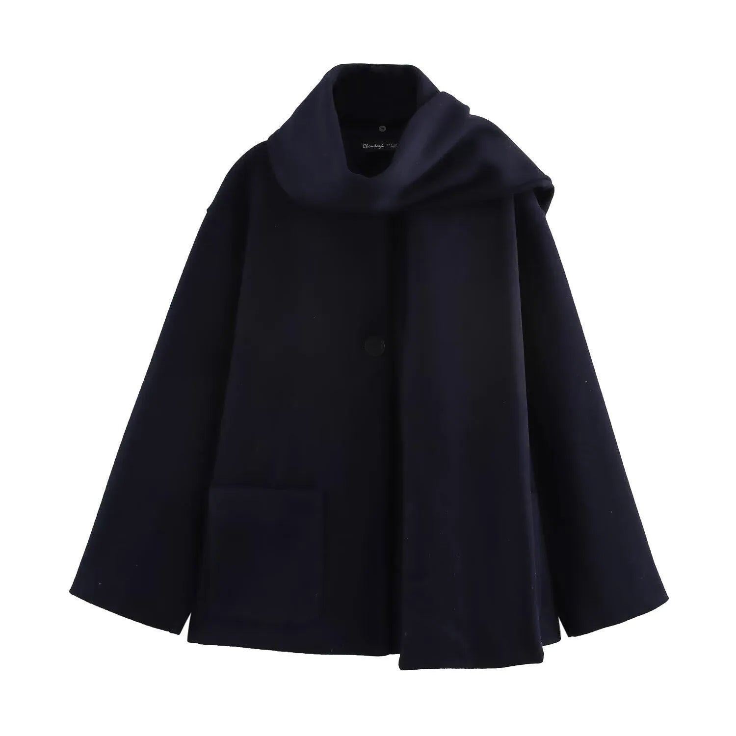 Women's long grey polyester overcoat with artificial fur collar and pockets, styled in street fashion.