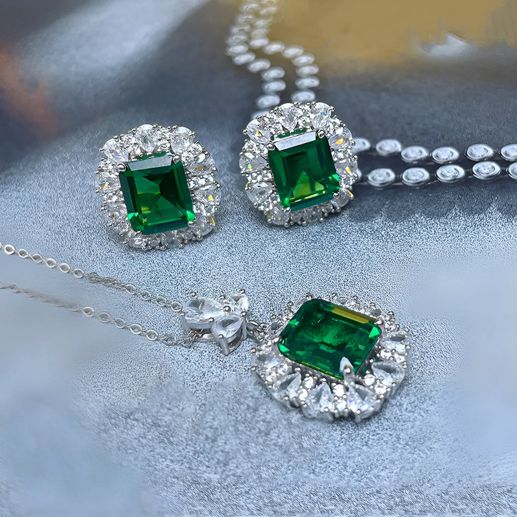 Women's French royal style copper jewellery set with floral patterns, showing earrings, necklace, and ring.