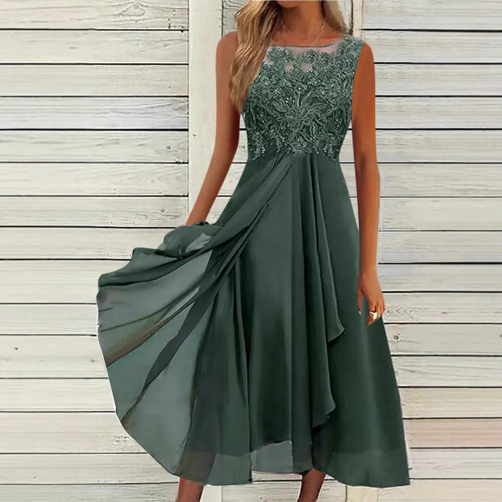 Women's sleeveless chiffon dress with hollow-out lace detail in green, shown on a hanger.