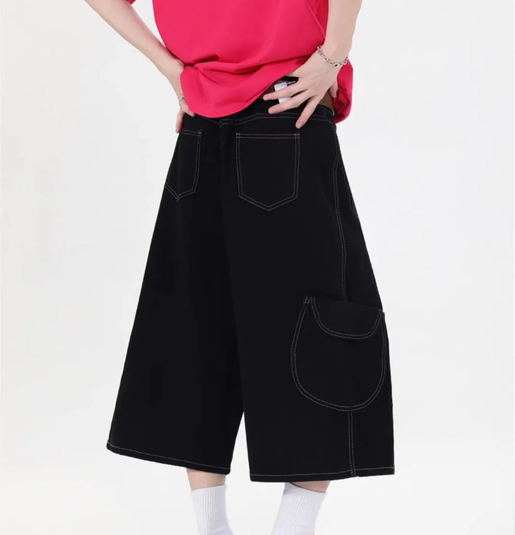 Retro denim wide-leg cropped trousers with multiple pockets, shown in red and black colour options.