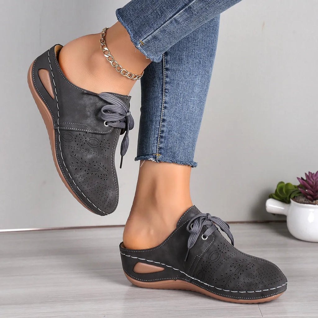 Women's lace-up wedge slippers with hollowed-out design in suede and rubber construction