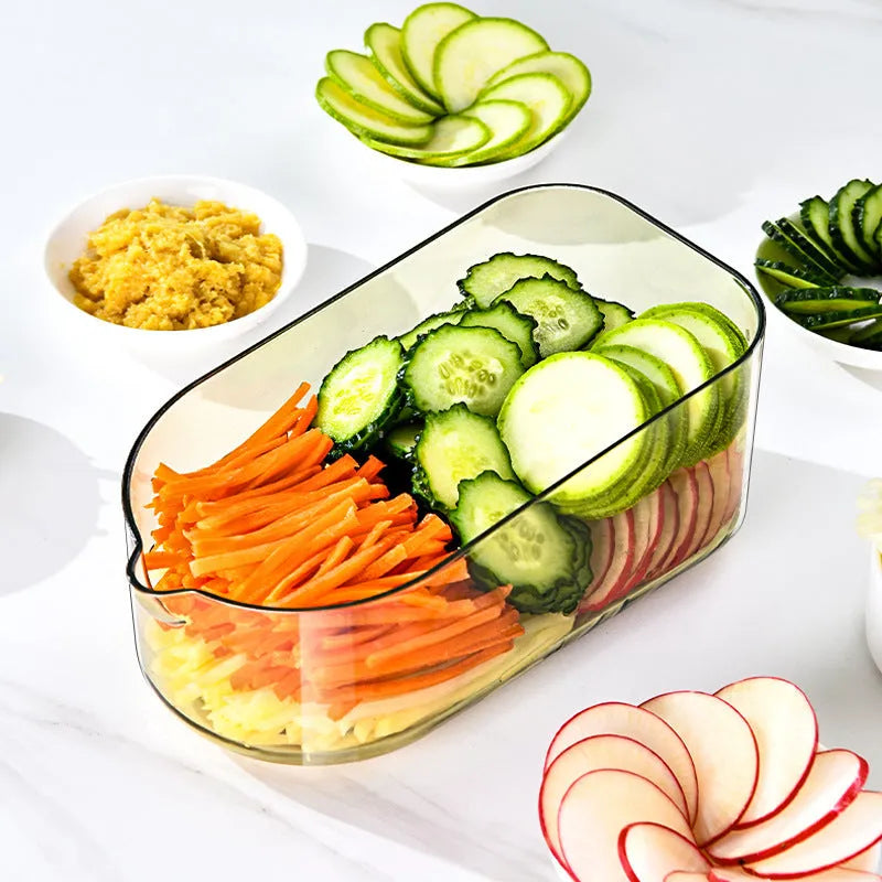 Transparent green kitchen chopper with stainless steel blades and optional drain basket on countertop