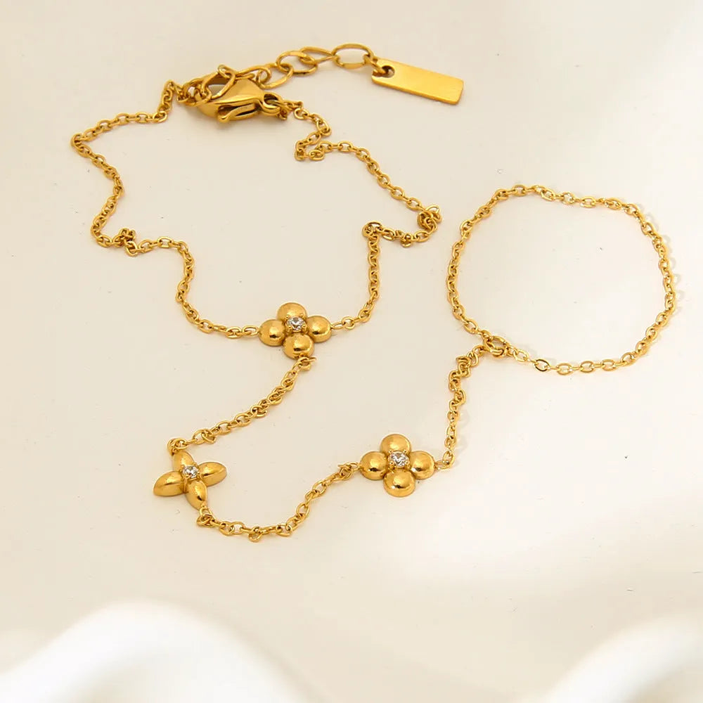 Gold colour stainless steel bracelet with flower and eight-pointed star geometric design for women