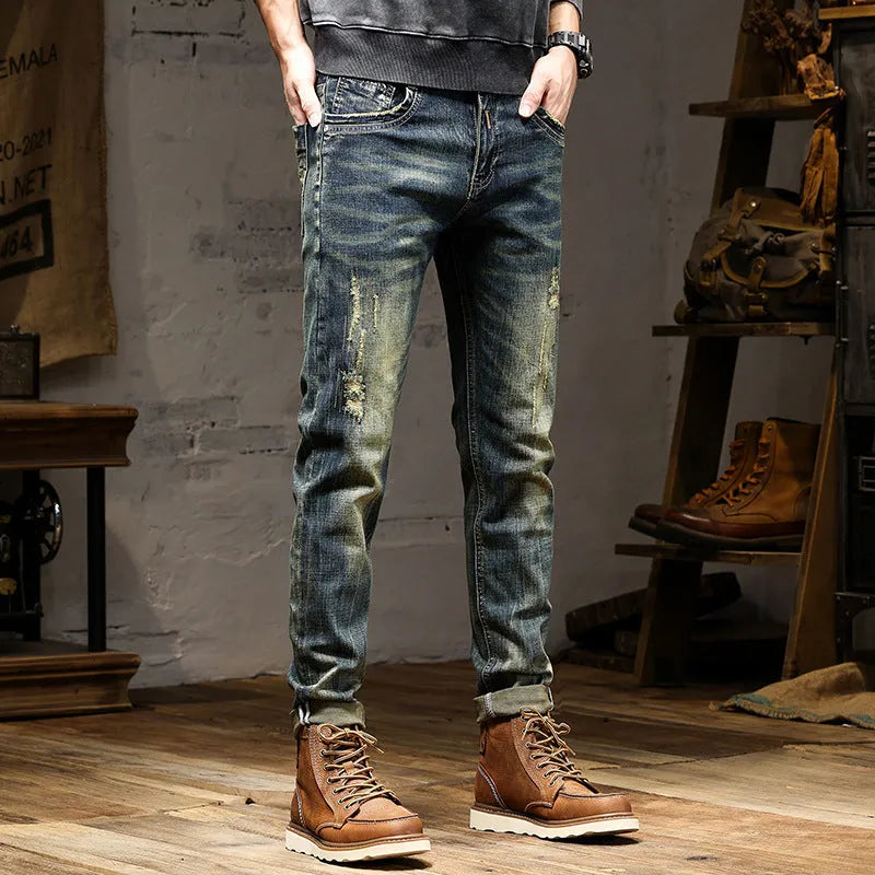Men's retro colour skinny jeans with a zip fly, shown laid flat.