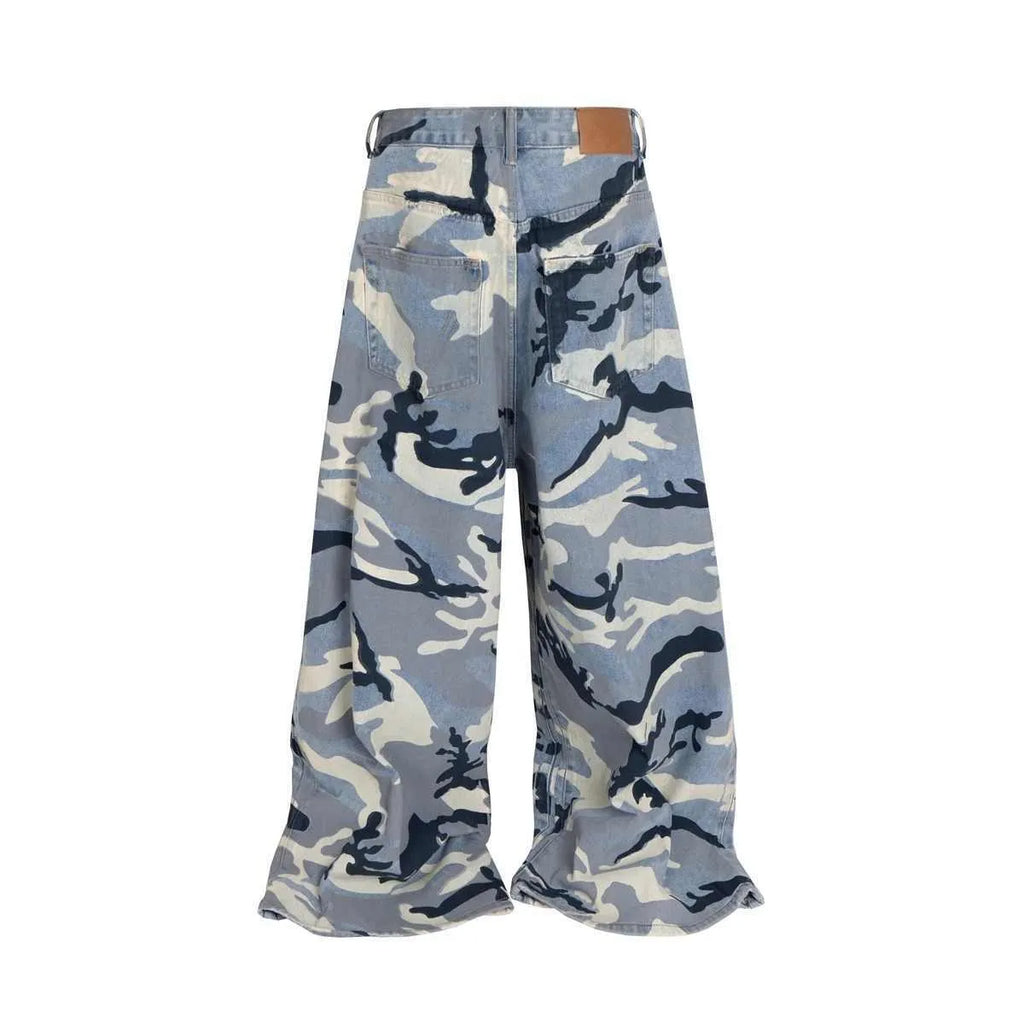 Snow camouflage blue loose-fit denim jeans on a mid-waist mannequin, showing the trousers length and camouflage pattern.