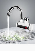 White electric water heater tap with digital temperature display showing instant hot water capability