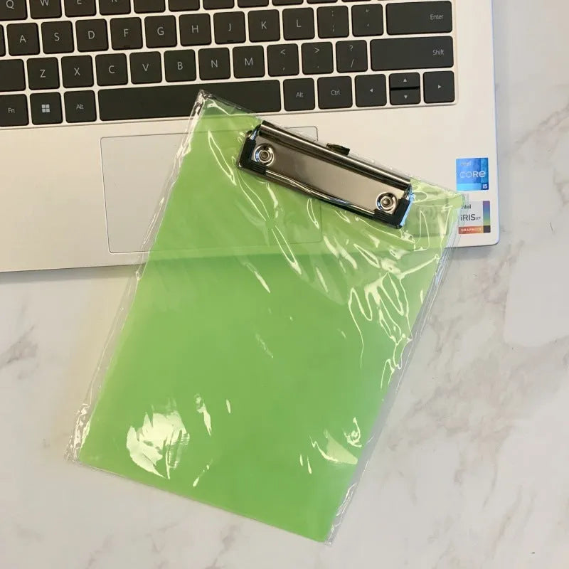 Transparent A4 plate holder with metal clip, shown in blue, acting as a writing board and document folder.