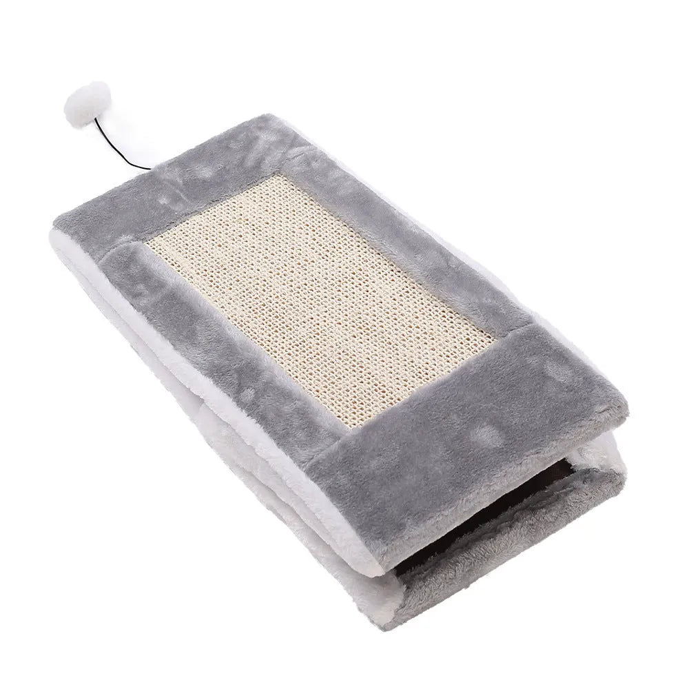 Triangular grey and white cat bed with integrated sisal scratching surfaces.