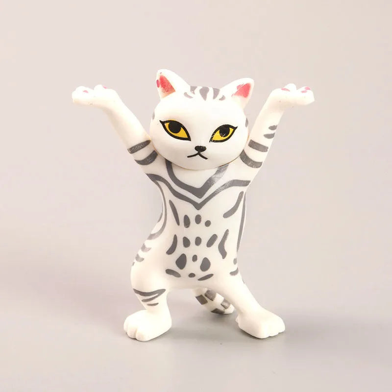 Resin cat pen holder, 5.5x3.2cm, in black, blue, grey, orange or white cat design on a desk