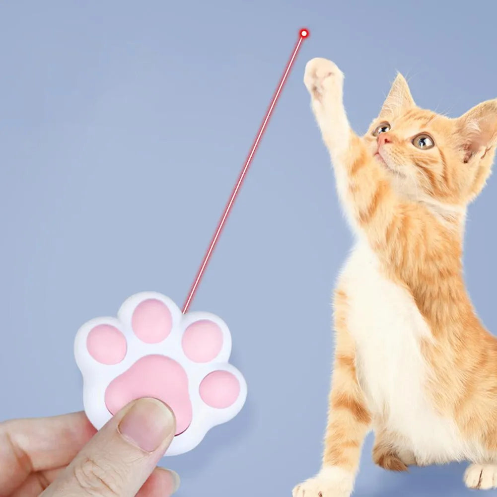 Compact black infrared cat teaser toy with USB charging port and keychain attachment