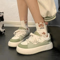 Green women's casual shoes with PU mesh upper and flat heel design