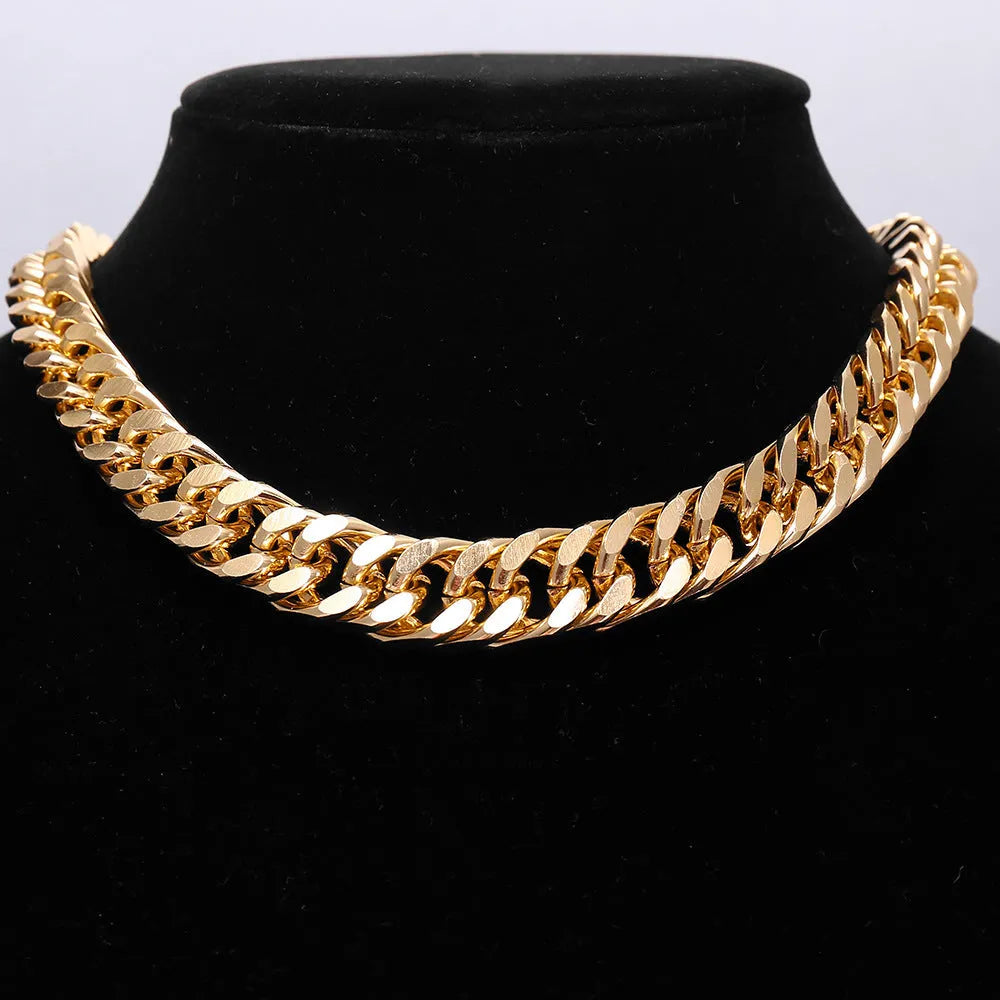 Women's gold tone thick chain necklace showing alloy construction with electroplated finish