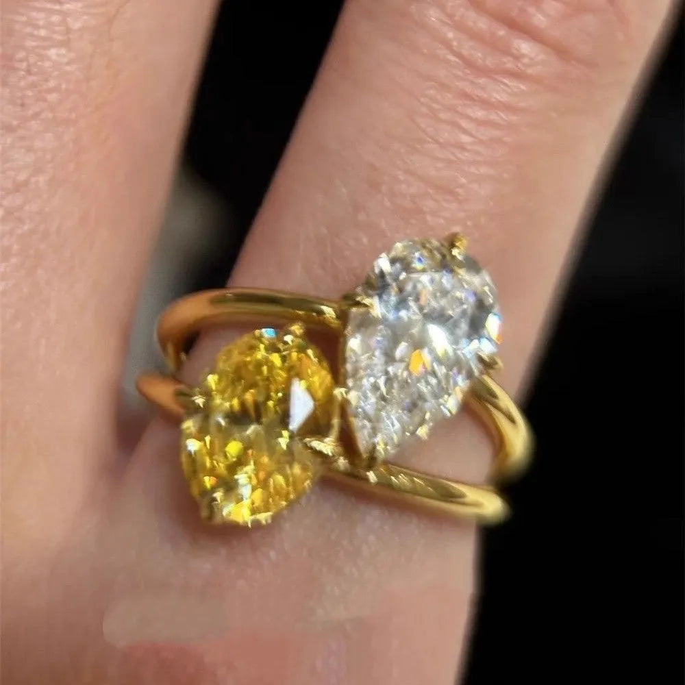 Copper geometric women's open ring with water drop double Sheng stone in contrast colour zircon setting
