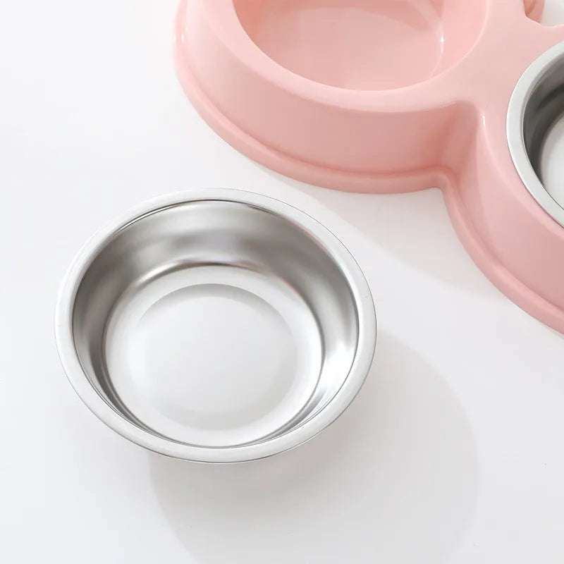 Stainless steel pet bowl with ceramic frog base and dual food water compartments