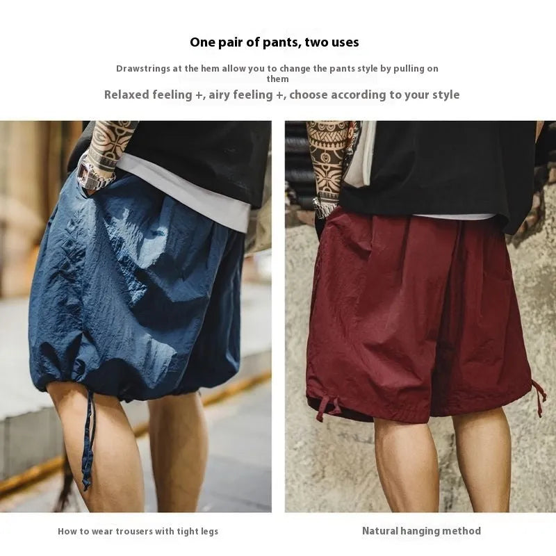Men's loose fit embroidered beach shorts in Prussian Blue nylon fabric