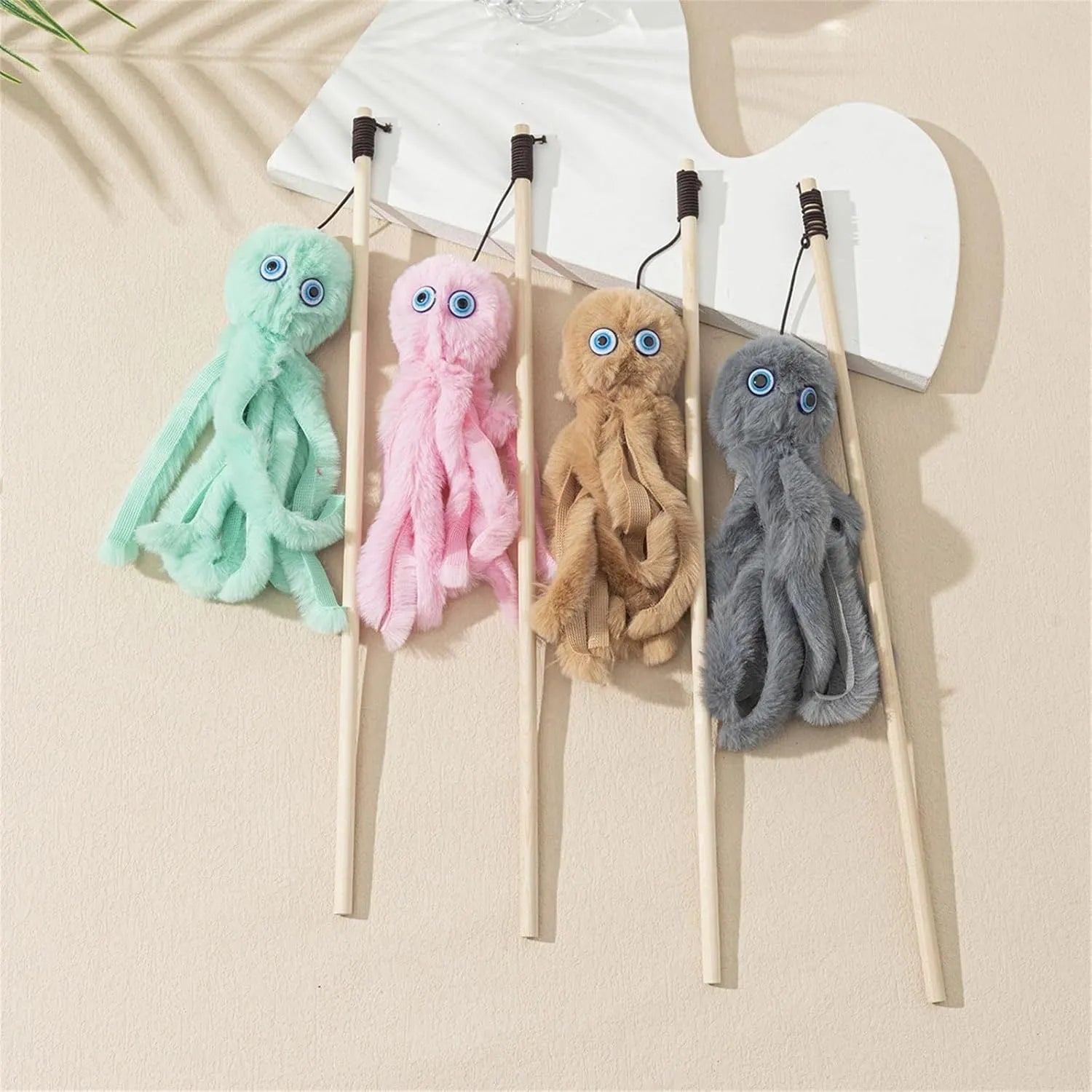 Brightly coloured cat octopus toy with long stick wand for interactive play with indoor cats