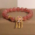 Women's strawberry quartz crystal bracelet with four-leaf dream catcher ball pendant