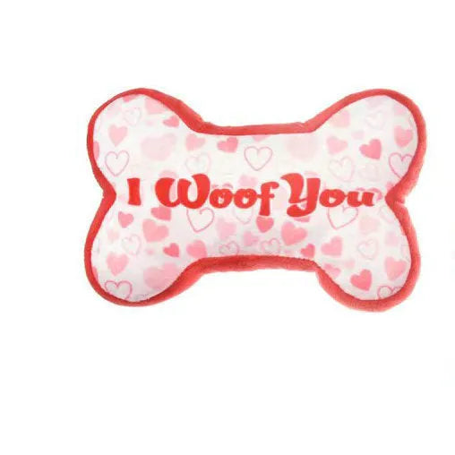 A PP plastic plush pet chew toy in one of four colours: bone powder, bone white, peach heart pink, or peach heart red.