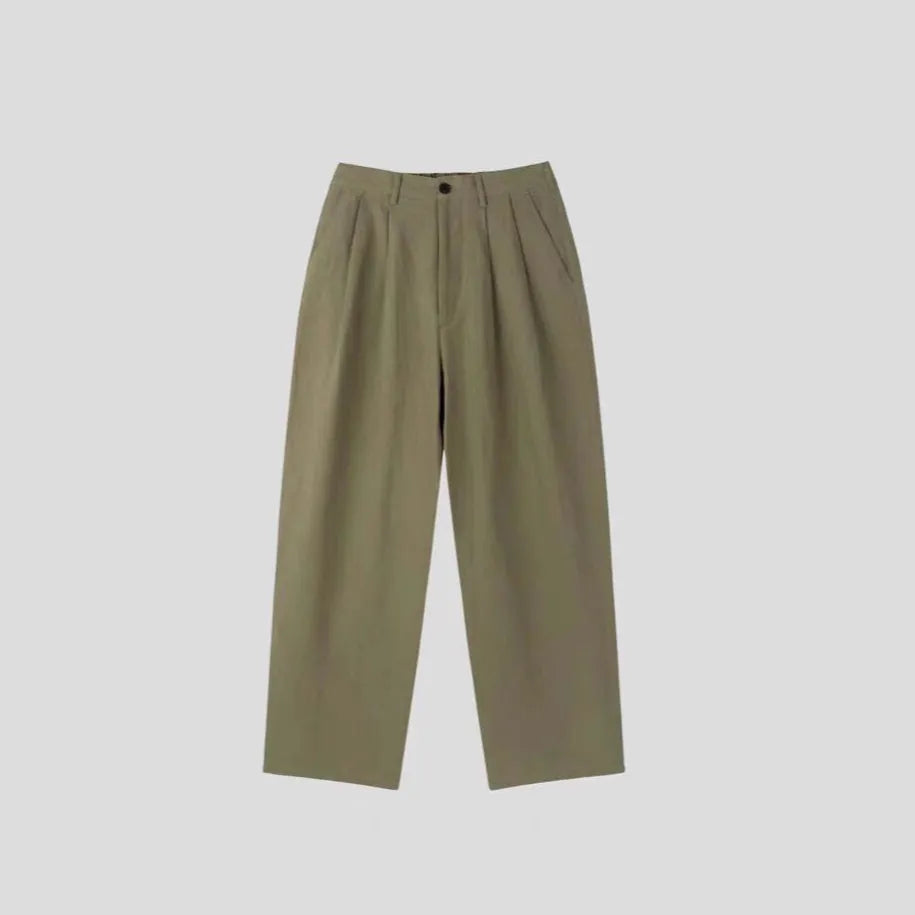 Men's apricot-coloured wide-leg cotton linen blend trousers with a mid waist and pencil pant cut.