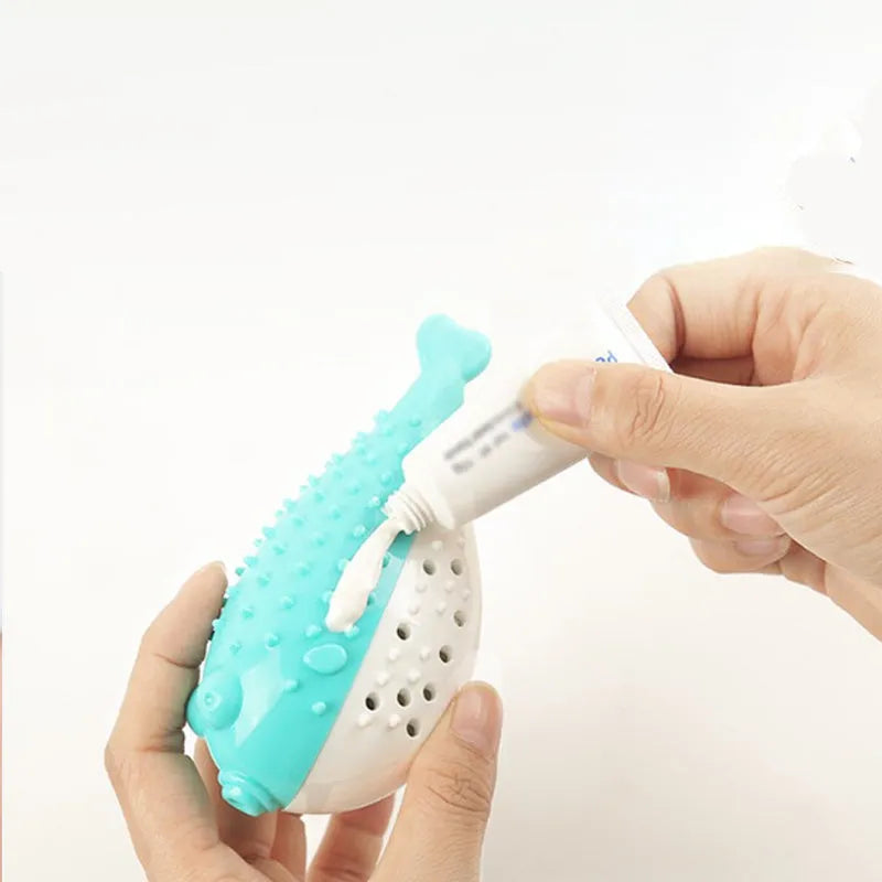 Blue silicone fish-shaped cat chew toy with toothbrush texture for grabing and chewing