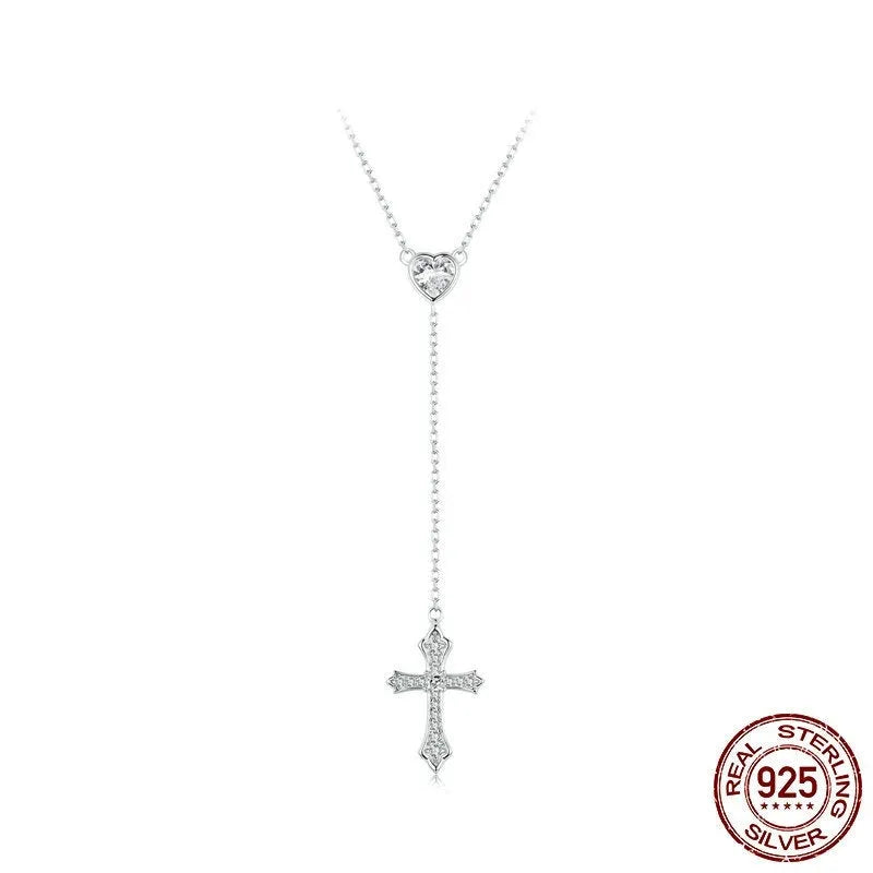 Close-up of a sterling silver V-neck cross pendant on an O-ring chain, colour BSN384.