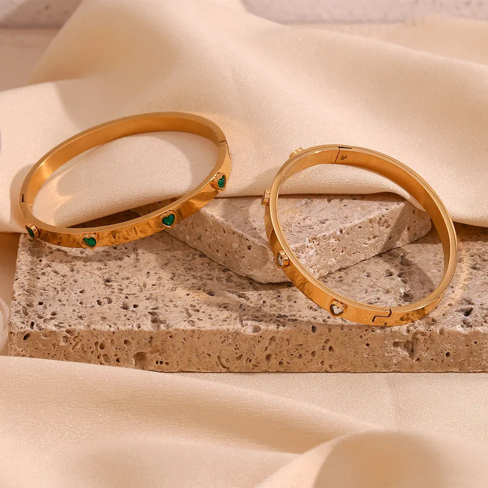 Stainless steel peach heart bracelet with micro-inlaid coloured stones in gold electroplated finish