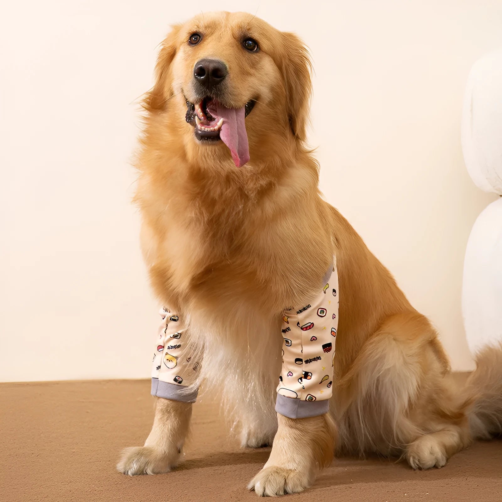 Blue dog knee protector sleeve with padded elbow patch and matching scarf, showing plastic buckle adjustment.