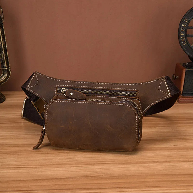 Brown cowhide leather men's sports waist bag with pull closure showing dimensions