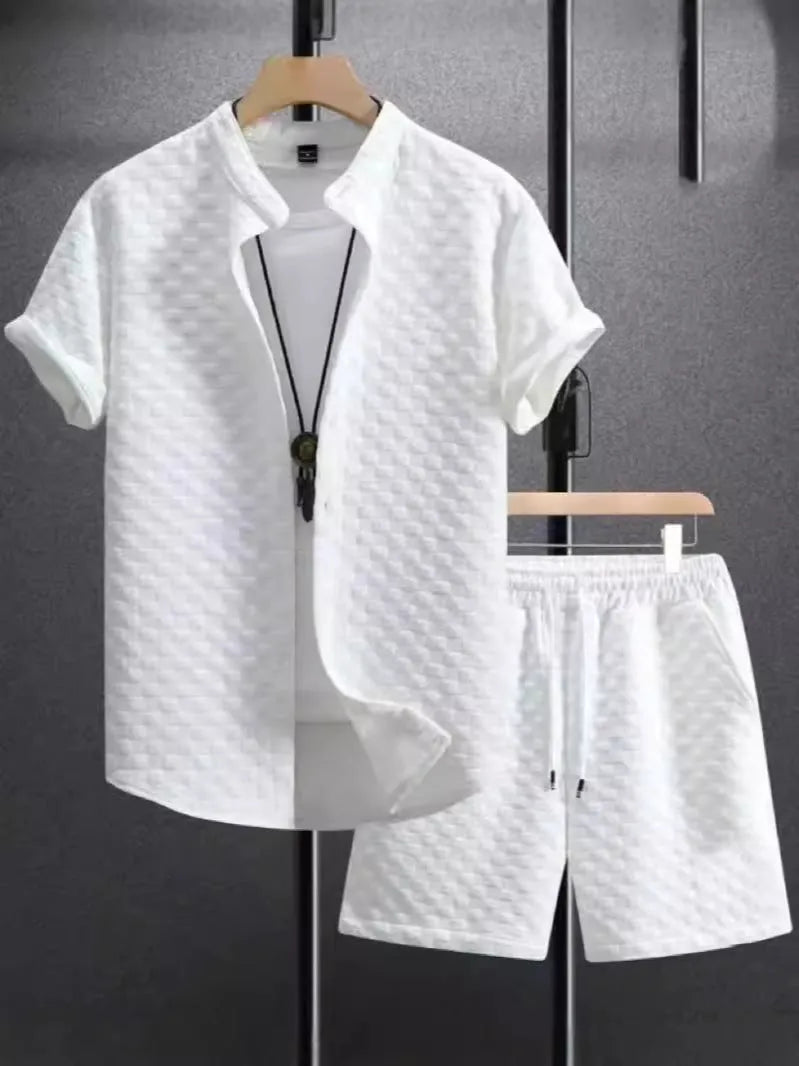 Mens black and white jacquard short sleeve shirt and matching shorts suit set on a hanger.