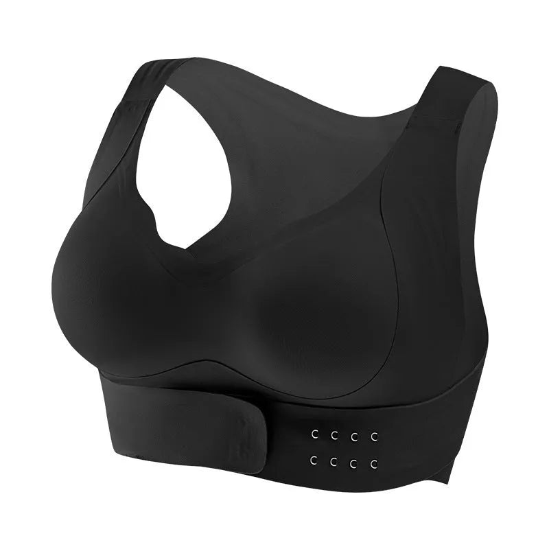 Women's front buckle sports bra in black, white, or nude for yoga and exercise.