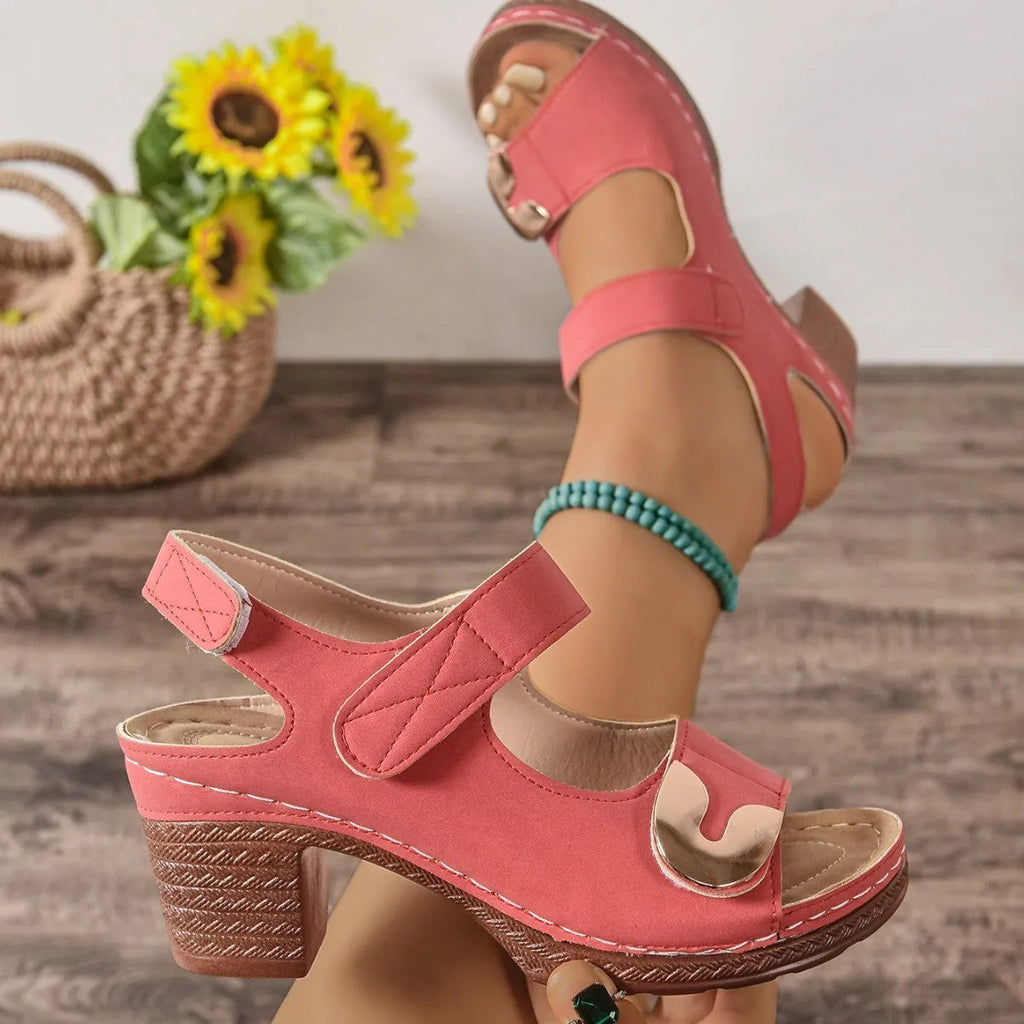 Light brown European-style sandals with a round toe and a single black Velcro strap closure.