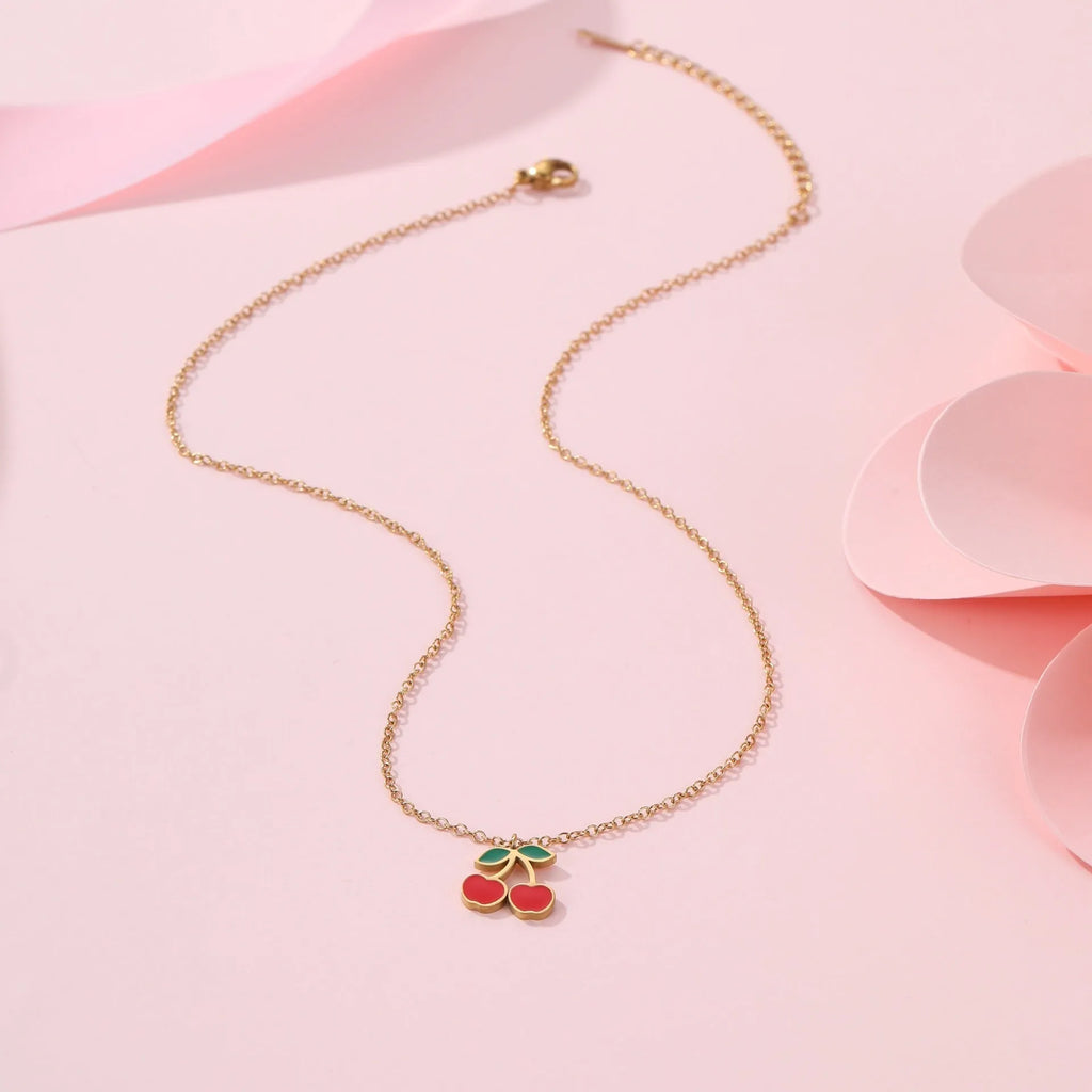 Cherry jewellery set with gold-plated necklace, bracelet, earrings, and ring on stainless steel chain