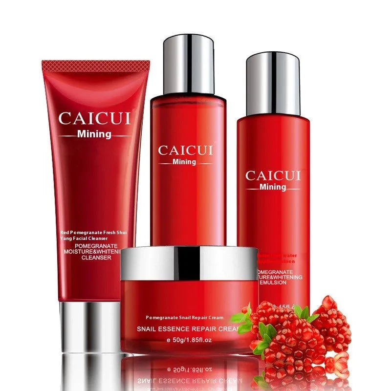 Red packaged pomegranate skincare set with cleanser, toner, lotion and cream bottles