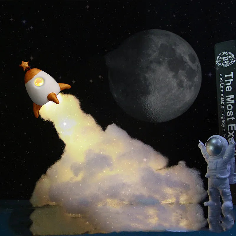 DIY astronaut rocket LED night light kit with warm string lights and rocket model for desktop decoration