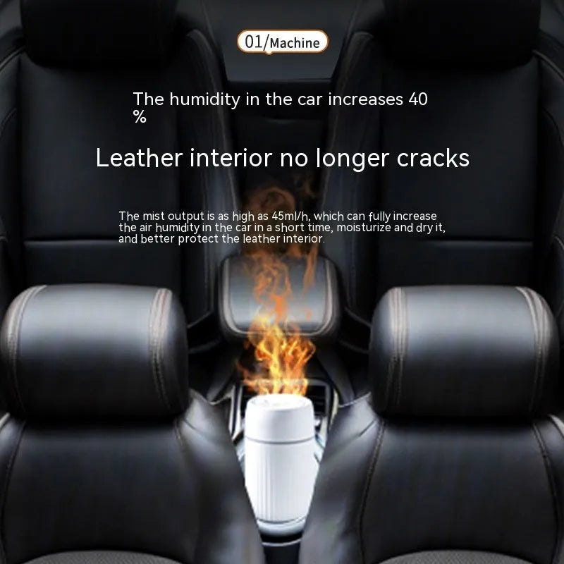 Black and white car aroma diffuser with simulation flame effect on a car console.